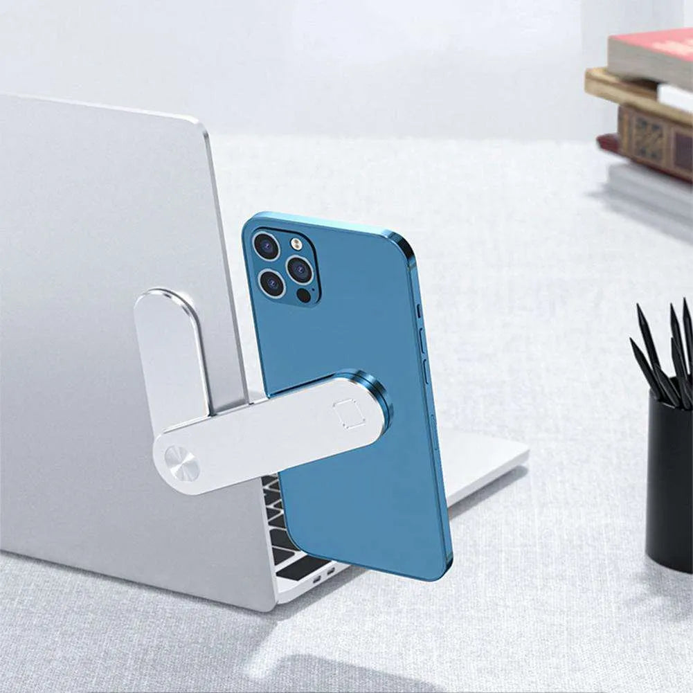 Black aluminium laptop phone holder with magnetic mount attached to laptop showing dual screen setup