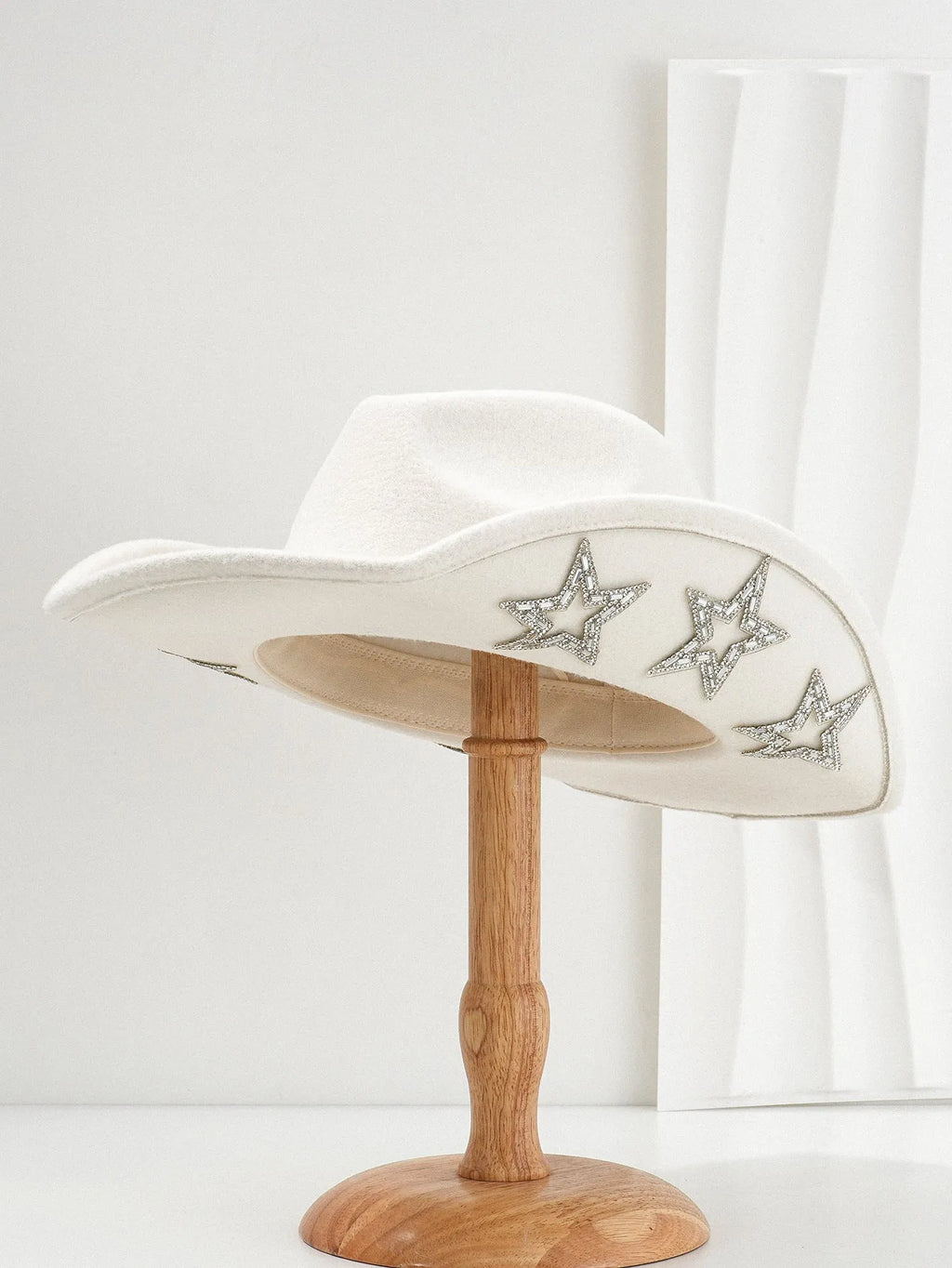 Brown polyester western-style top hat with a conical crown and a silver hexagonal star decoration on the front.