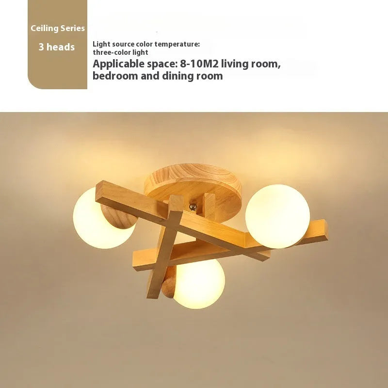Wooden style modern ceiling light with three neutral light heads in Nordic design