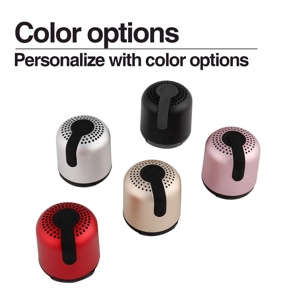 Hieha XQ11 mini Bluetooth speaker with heavy metal design in black, showing compact size and 360 degree sound capability