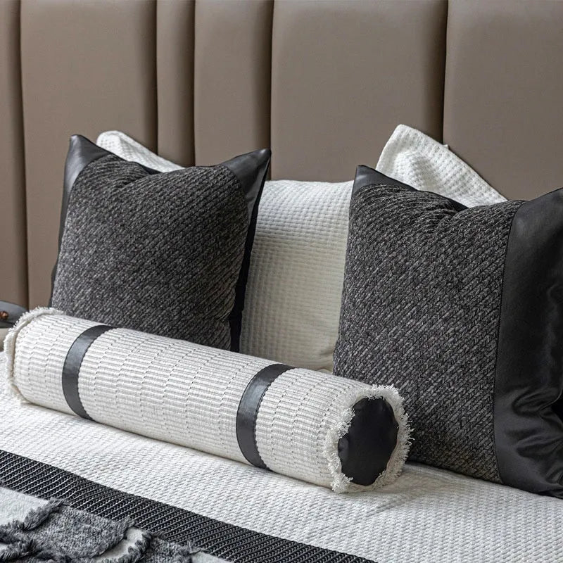 Modern minimalist grey and white plaid bed runner blanket set with matching pillow on a double bed