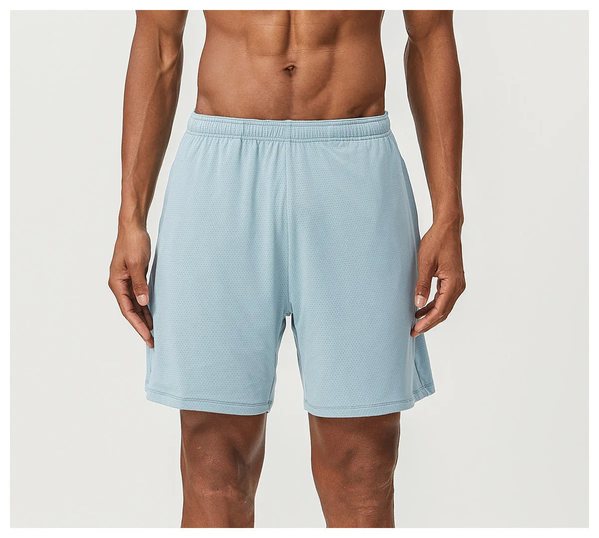 Men's quick-dry double-layer running shorts in various colours on a neutral background.