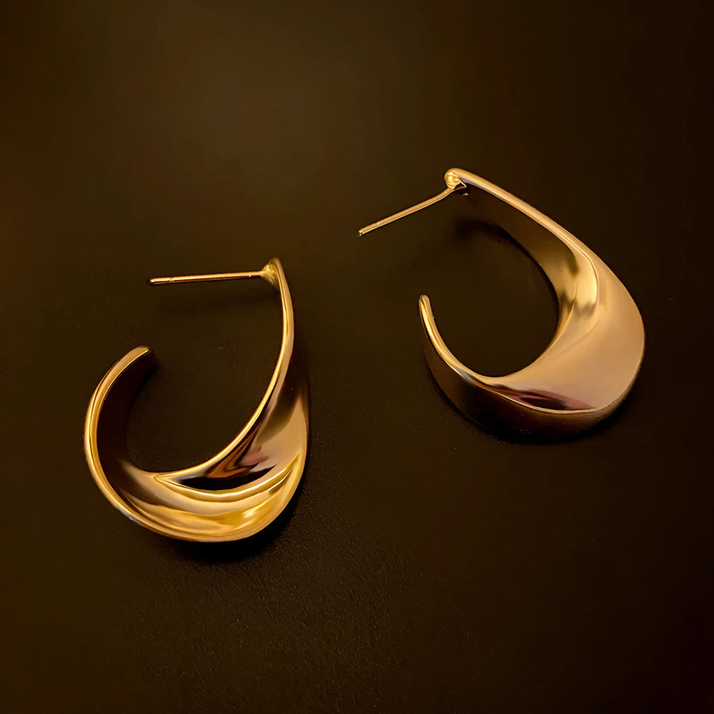 Twisted geometric metal earrings with electroplated gold or silver finish