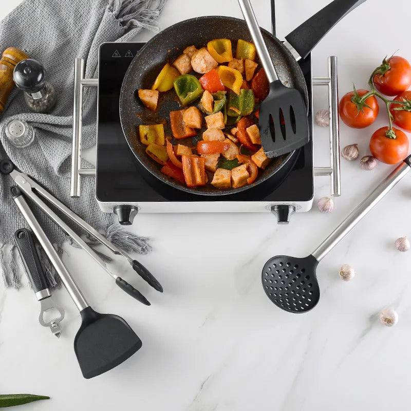 Black silicone cooking spatula and spoon set with stainless steel handles containing 16 kitchen utensils