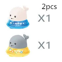 Automatic water spray whale bath toy with colourful LED lights floating in baby bath