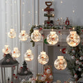 LED Christmas curtain light string with 10 decorative PVC lamp balls showing fairy, snowman, and wishing ball designs.