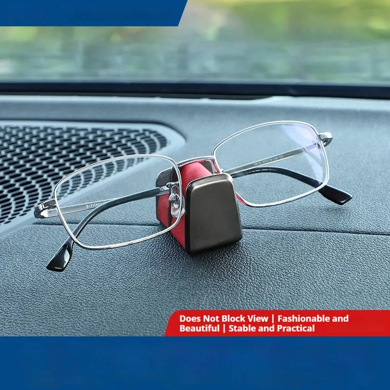 Zinc alloy and leather sunglasses clip for car dashboard storage in four colour options.