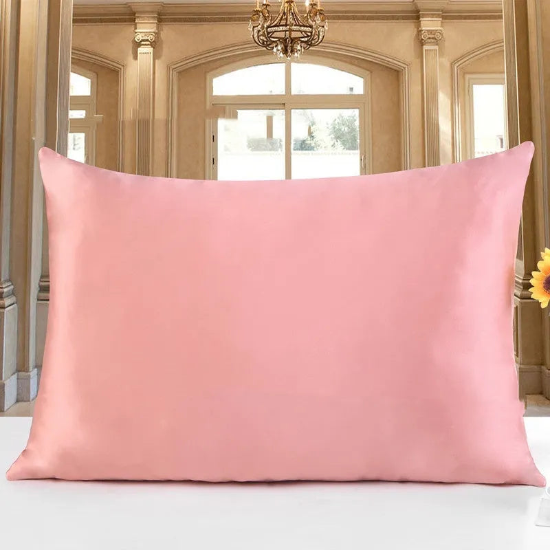 Double-sided silk pillowcase showing reversible design in apricot colour with three size options displayed