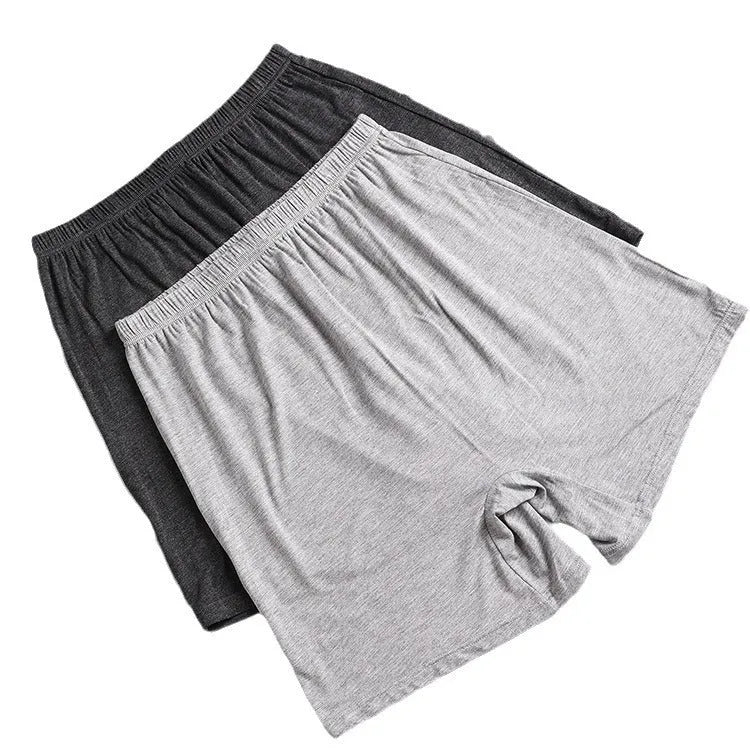 Men's solid colour modal boxer shorts with high waistband, shown in black, blue, gray, and brown.