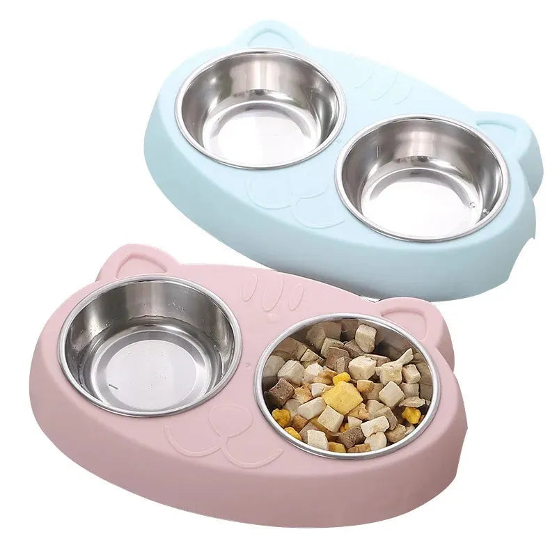 Blue macaron-styled double bowl plastic feeder tray for cats and dogs on a wooden floor.
