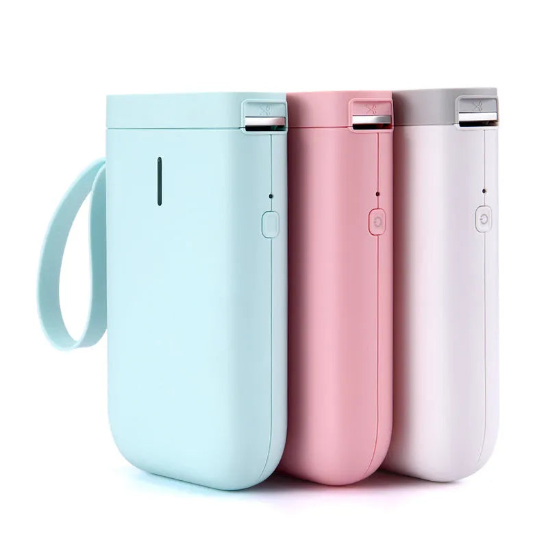 D11 Bluetooth-compatible portable label printer in black, white, pink, or green.