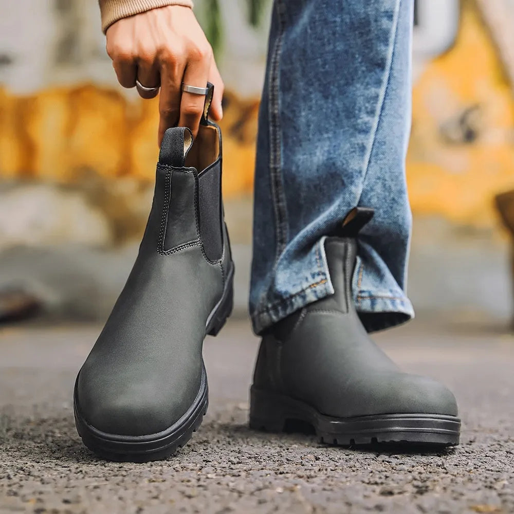 Vintage brown Chelsea boots with frosted PU upper and car suture detailing on a beef tendon sole