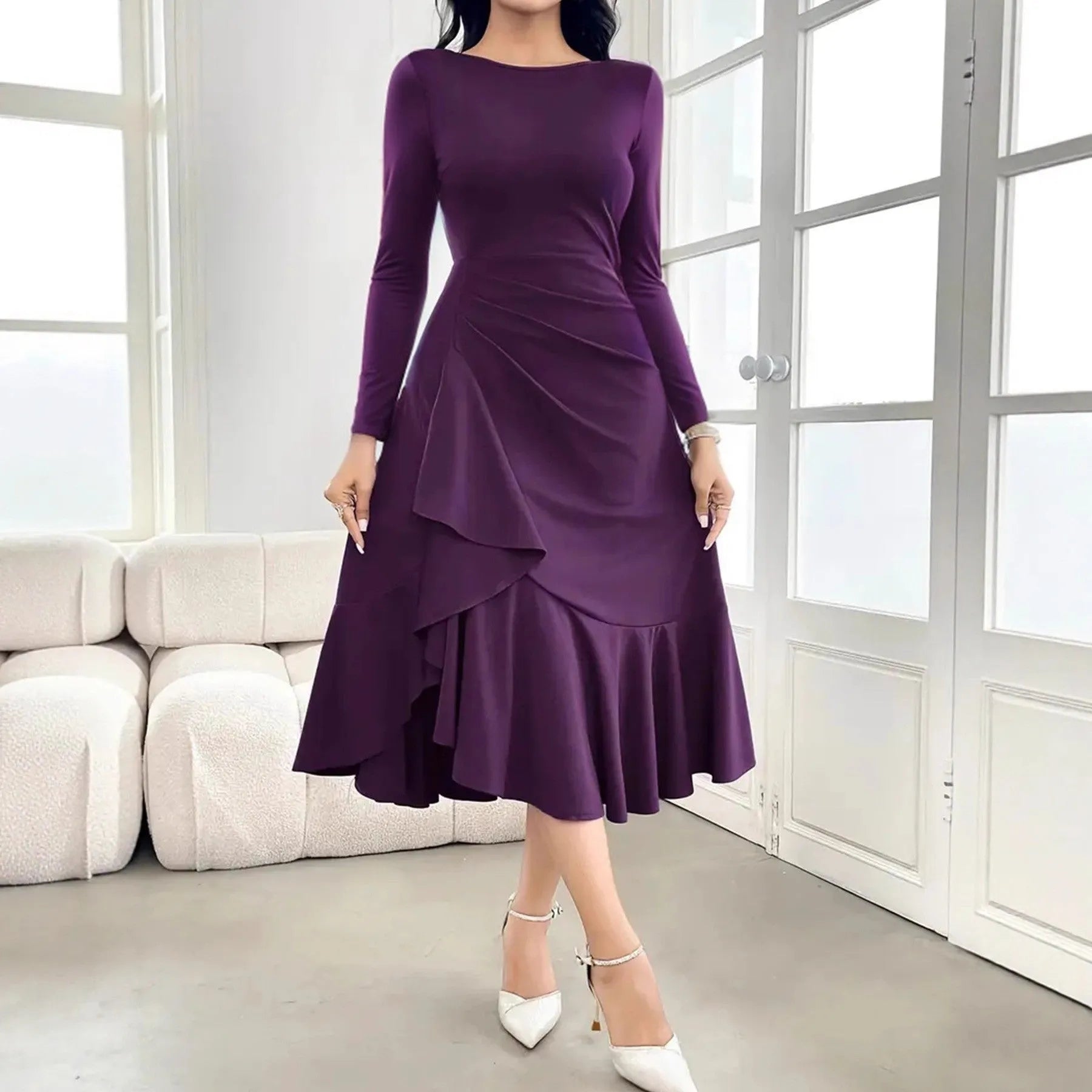 Purple women's long sleeve pullover dress with round neck and ruffle details on a mid waist.