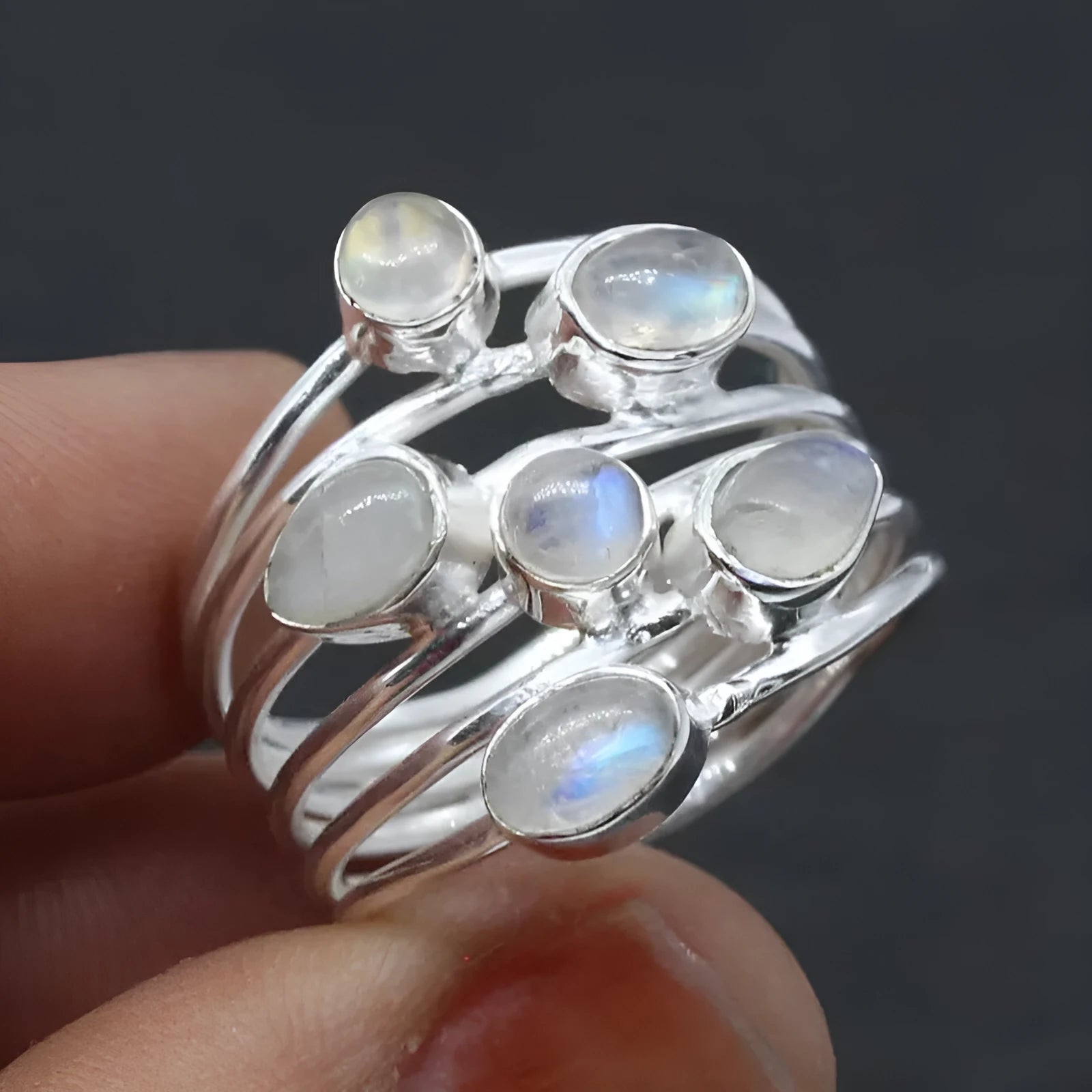 Silver irregular wide band ring for women made of zinc alloy on plain background showing full shape
