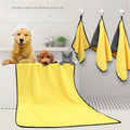 Yellow microfiber dog drying towel on hook, super absorbent for quick drying pets