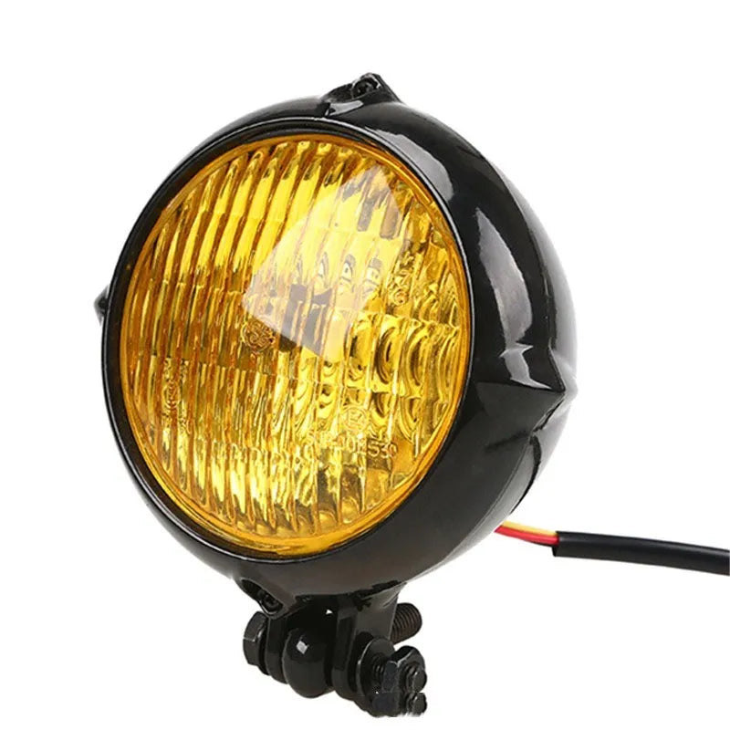 Retro-style black electroplated aluminium Harley headlamp with 8cm diameter and yellow halogen bulb