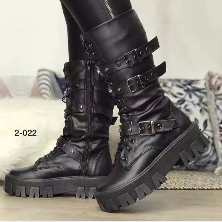 Women's black mid-calf boots with a metal buckle strap and side zipper, made of artificial PU leather.