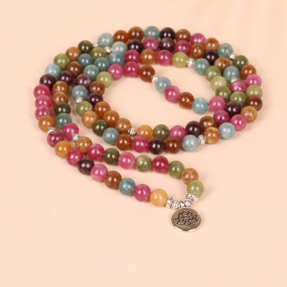 Multi-layer 108 bead bracelet with hanging lotus pendant in tourmaline colour