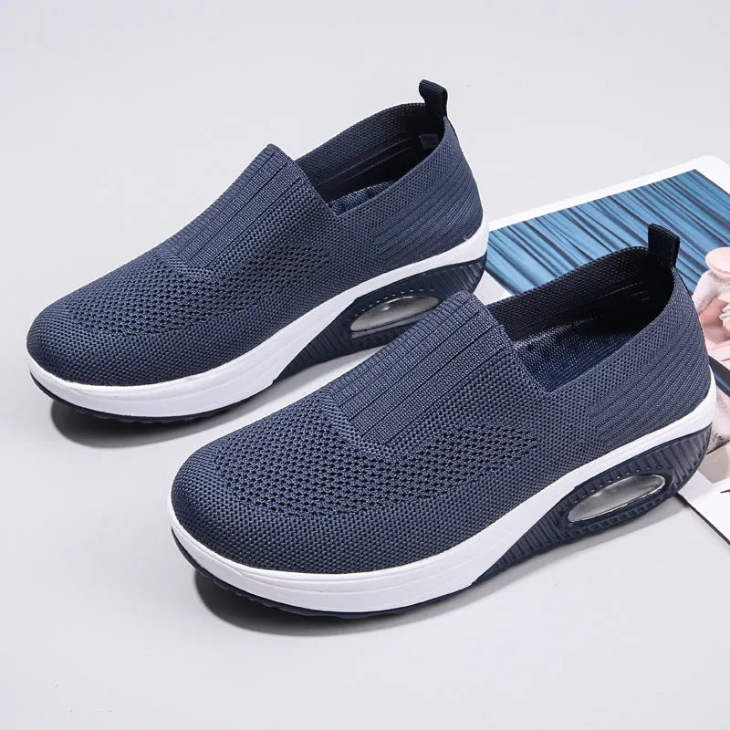 Women's mesh outdoor running shoes in beige colour with round toe design and air cushion