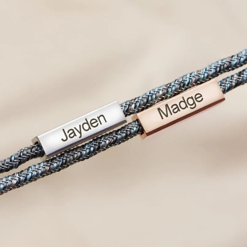 Pair of stainless steel magnetic couples bracelets with silver and rose gold finish, adjustable rope length
