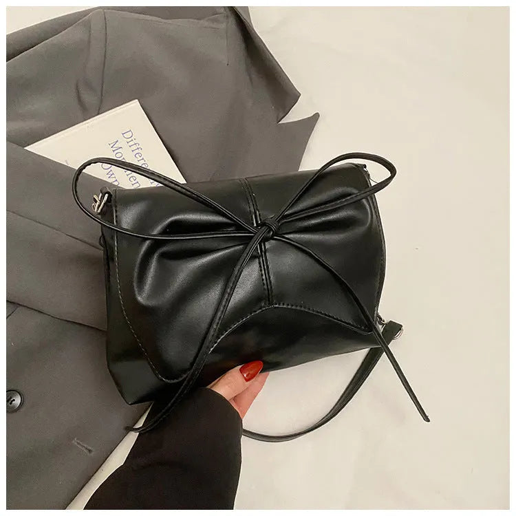 Women's large capacity horizontal square underarm bag in PU material with sewing line details and multiple colour options