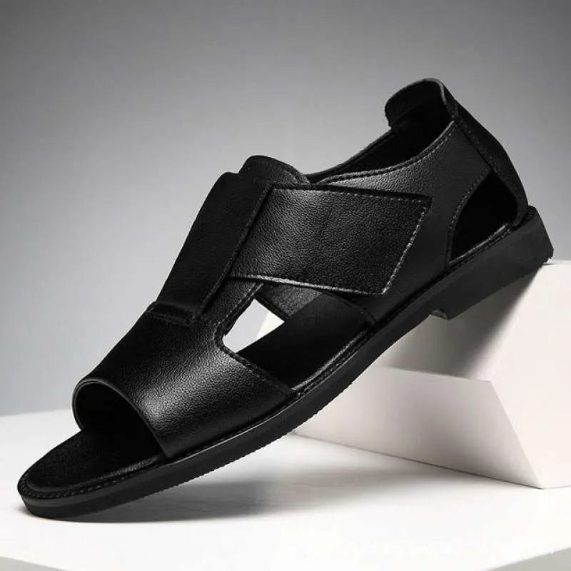 Men's black leather casual sandals with open toe and rubber sole on a plain background.