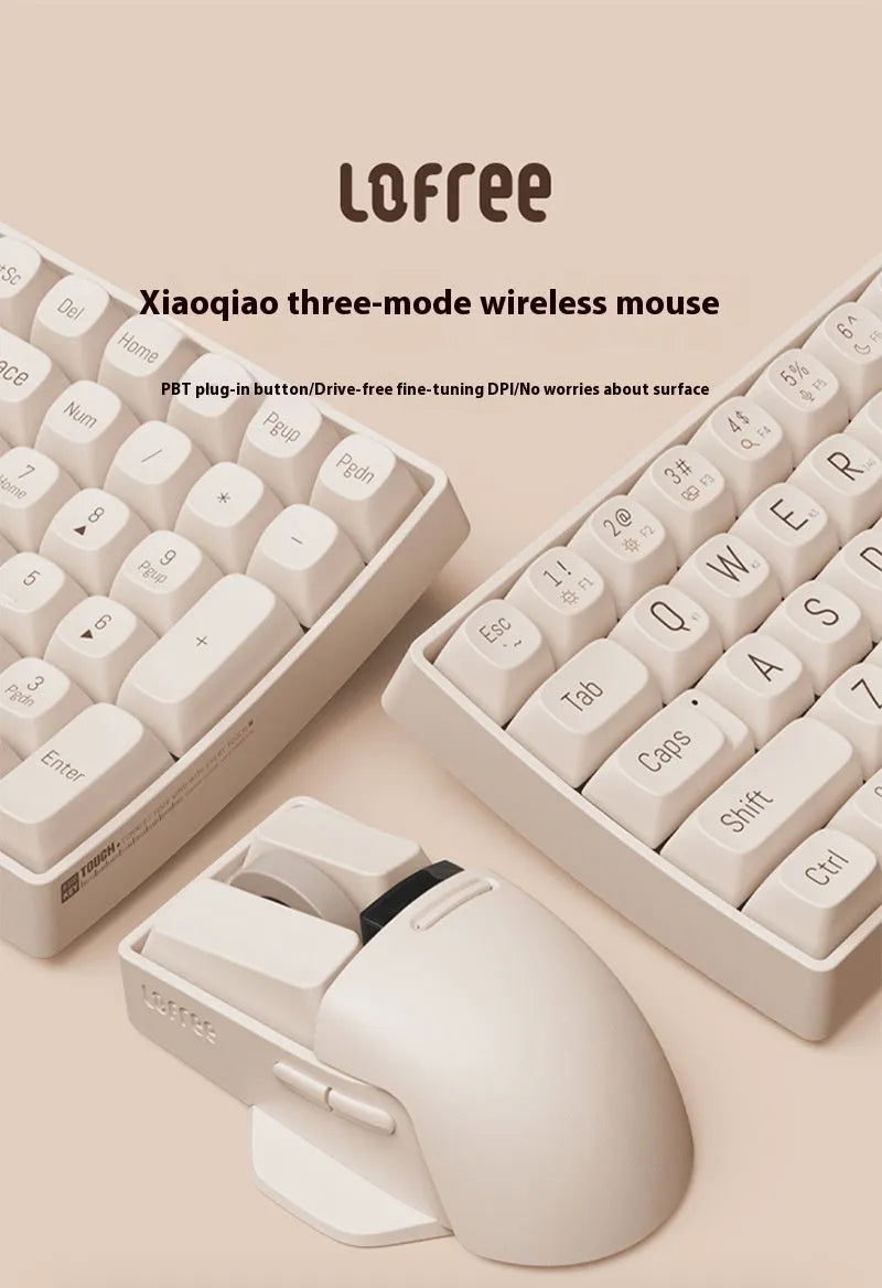 Xiaoqiao Tofu Colour wireless computer mouse with USB receiver on a desk.