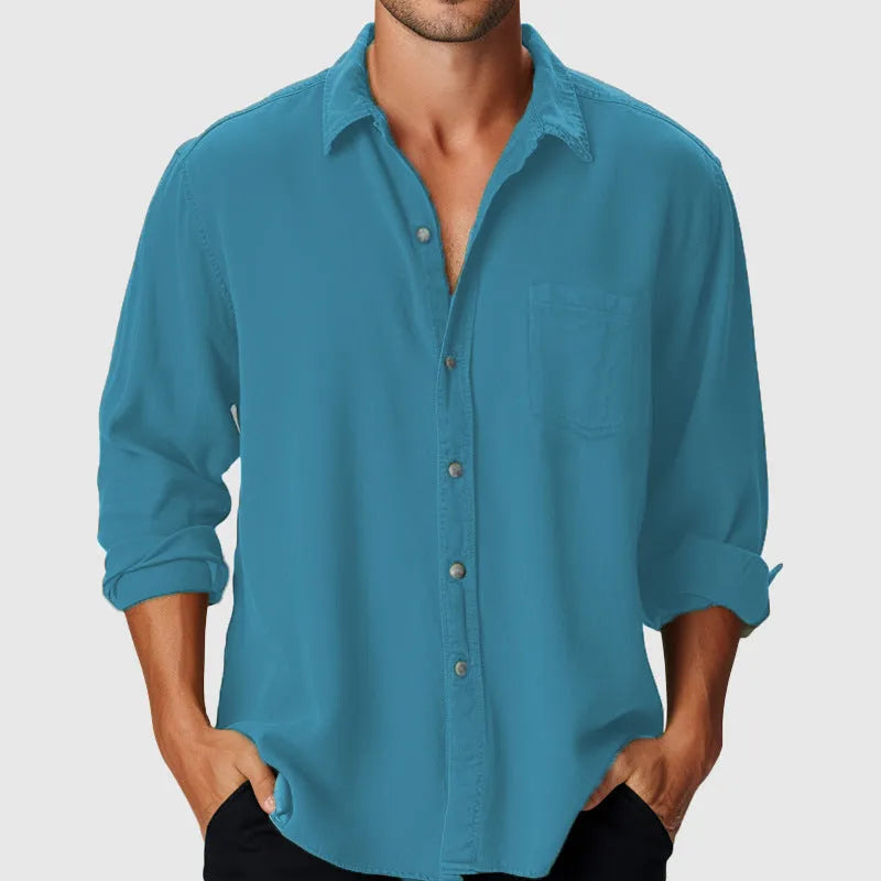 Men's loose fit polyester beach shirt with stand collar and long sleeves on a hanger.