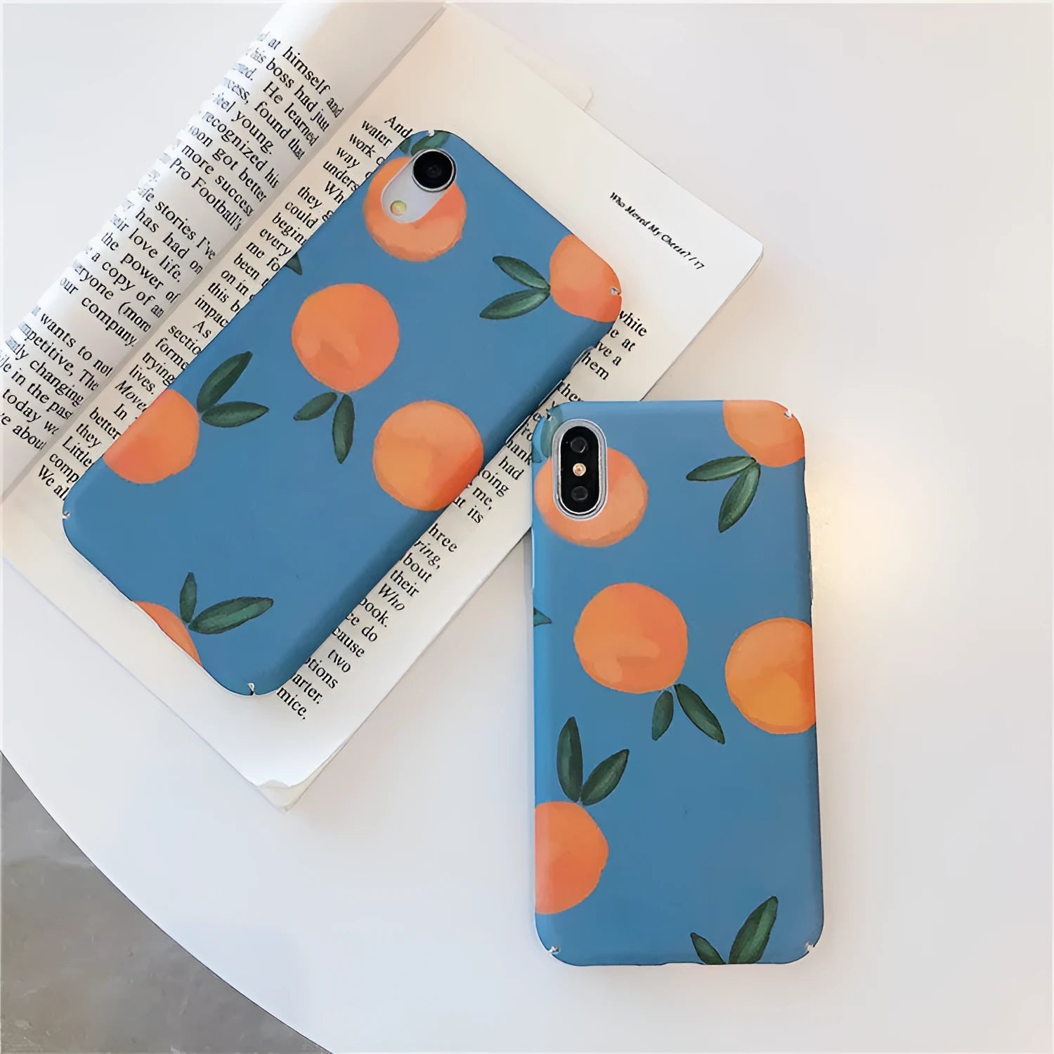 Orange retro plastic iPhone back cover with blue and water background design.