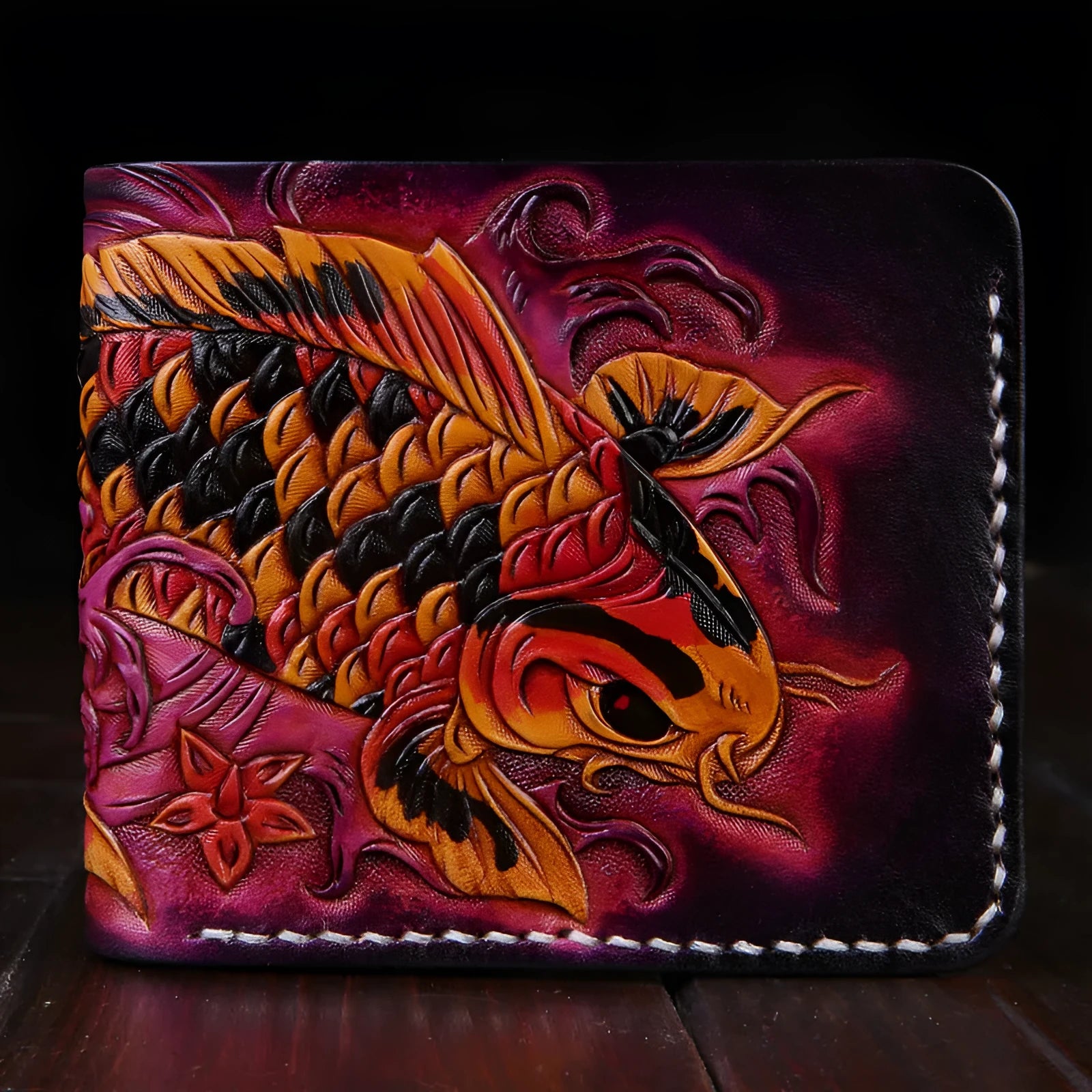 Men's carved cow leather short wallet in red, shown open, with dimensions 10cm by 12cm.