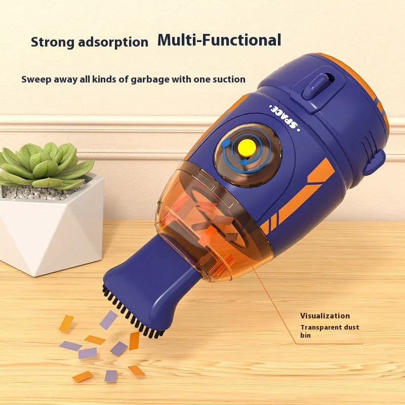 USB handheld desktop vacuum cleaner in blue rocket design on a wooden desk