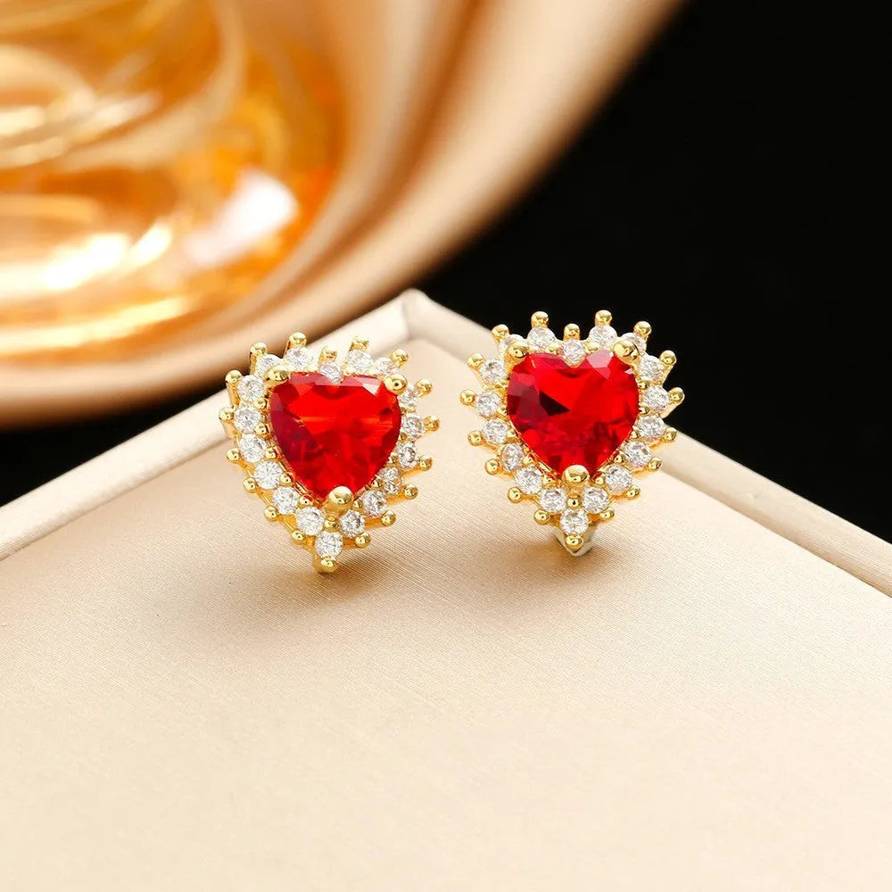 Women's titanium steel jewellery set with heart-themed mixed gem pendants in gold red colour