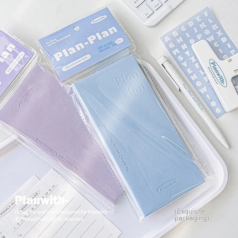 Embossed metre book notebook showing five cover colour options: white, purple, blue, grey and protective cover