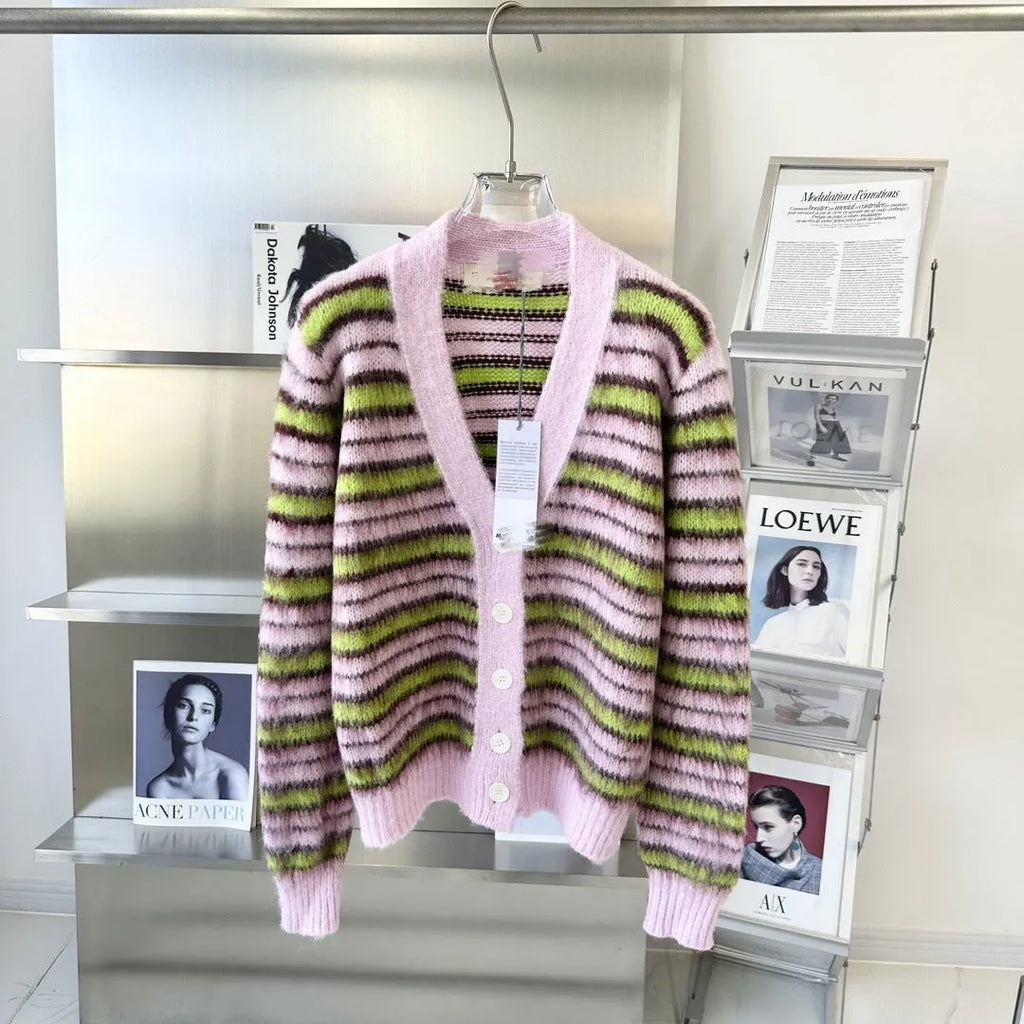 Pink haima wool lazy coat cardigan sweater with nap texture on a hanger