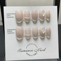 Women's handmade blush armour style short false nail set shown in 14-short ladder A colour.