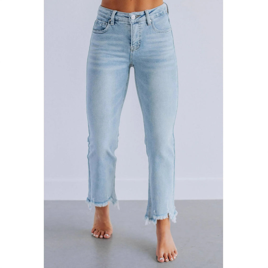 Women's casual denim pants with hand-worn distressing in dark blue or light blue solid colours