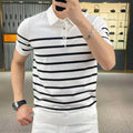 Man wearing a black and white striped knitted t-shirt with a lapel collar, showcasing a smart-casual look.