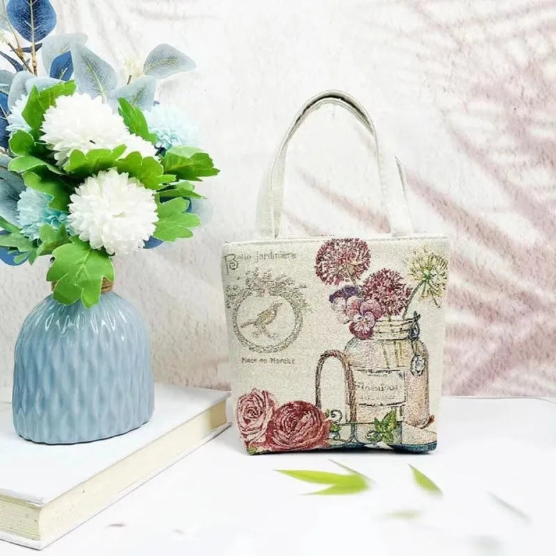 Double-sided gold wire embroidered canvas tote bag in small, medium, and large sizes with floral patterns.