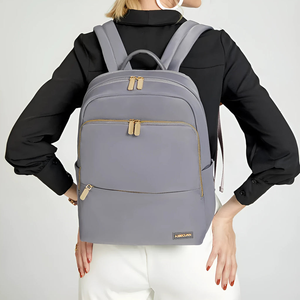 Large black Oxford cloth women's backpack with organisational compartments and a breathable back panel.