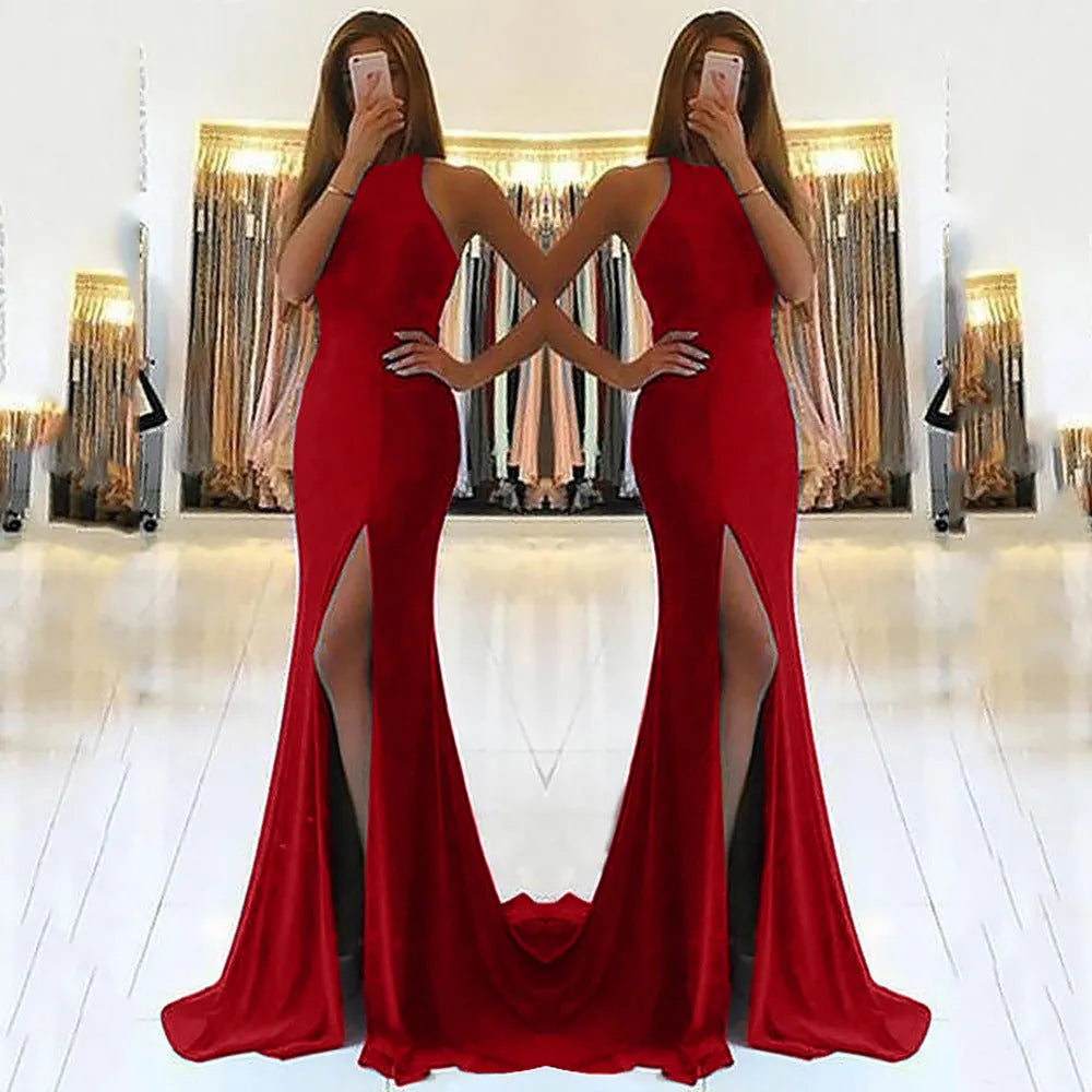 A long red evening dress with a high waist, large swing skirt, and hollow knit texture detail on the bodice.