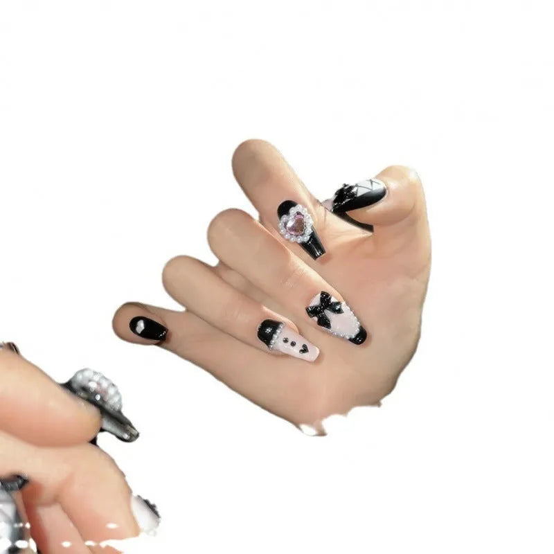 Black and pink heart hand-painted detachable manicure set with bow patterns in four sizes