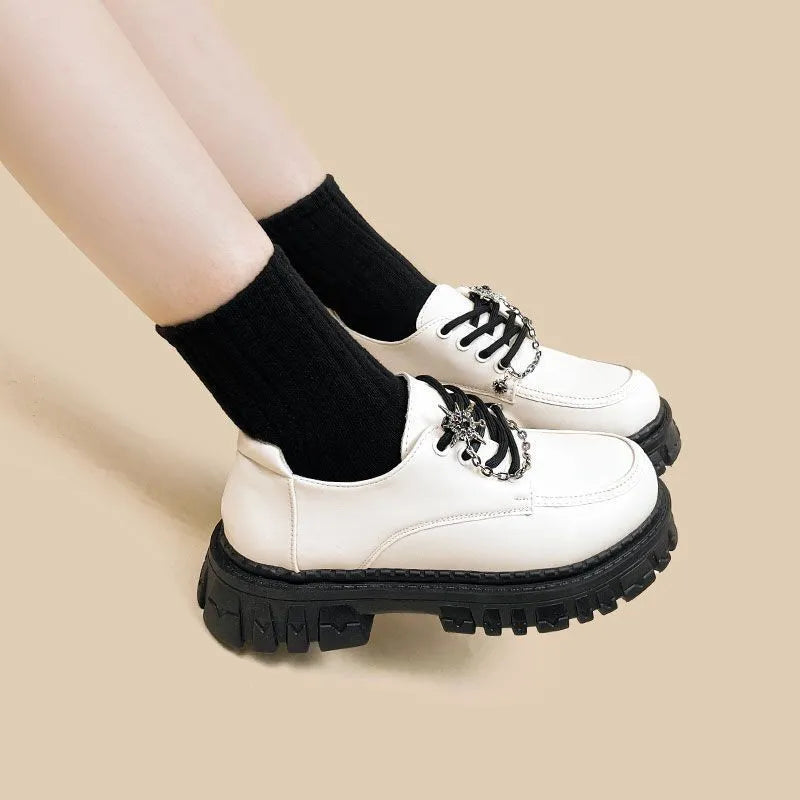 Women's Duke Asterism coloured loafers with a cross-strap and metal buckle, preppy style.