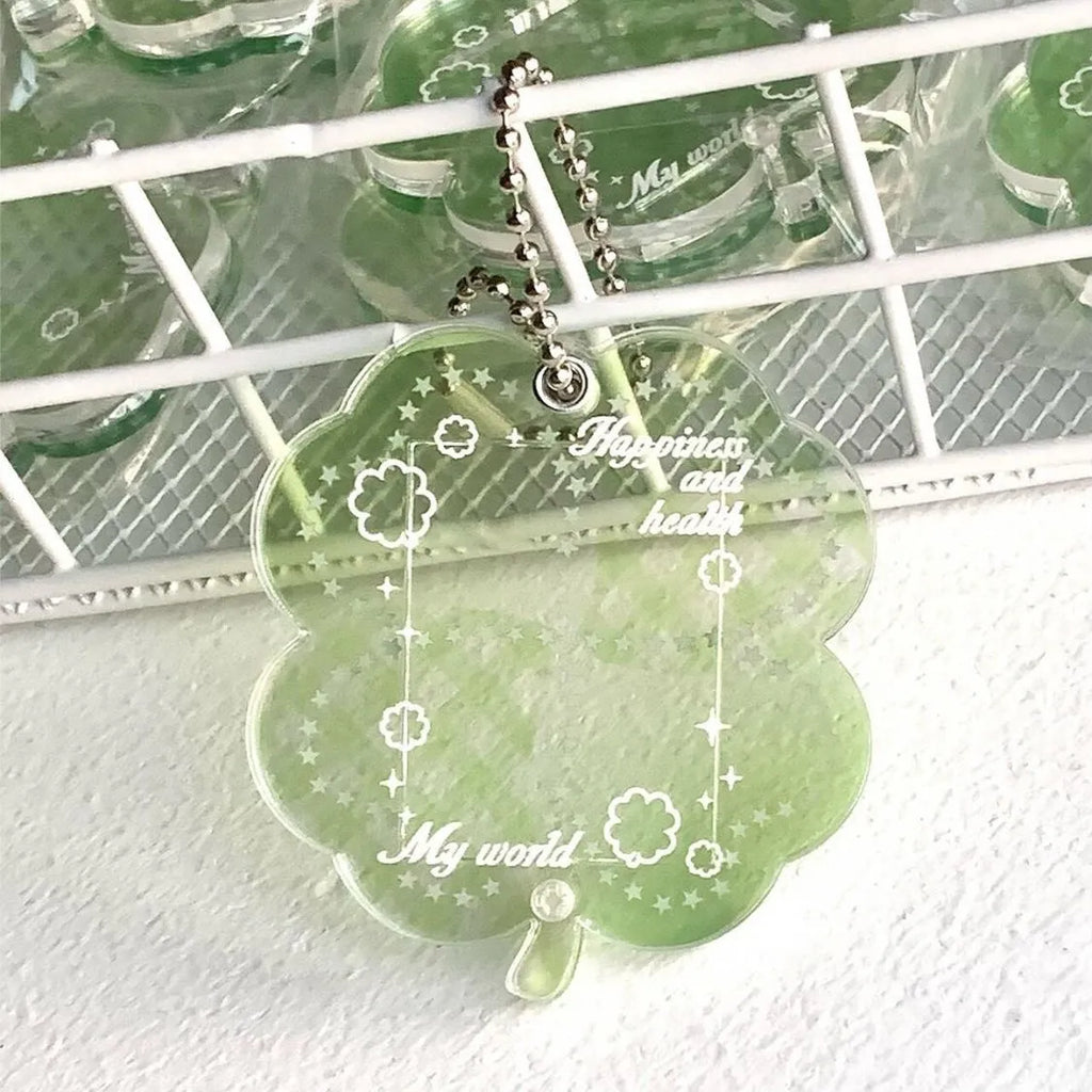 Acrylic four-leaf clover pendant keychain in elegant blue, grass green, or mint green.