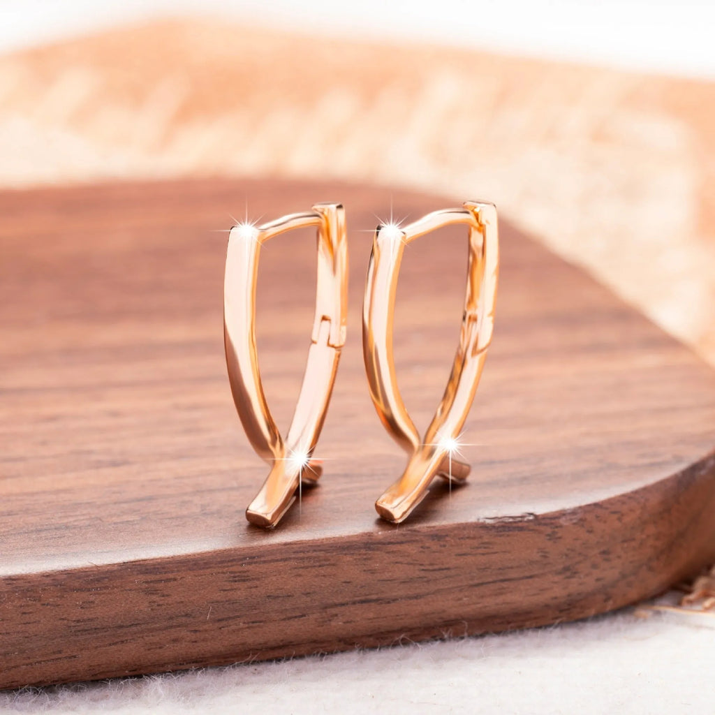 Rose gold cross shaped copper earrings single pair jewellery accessory