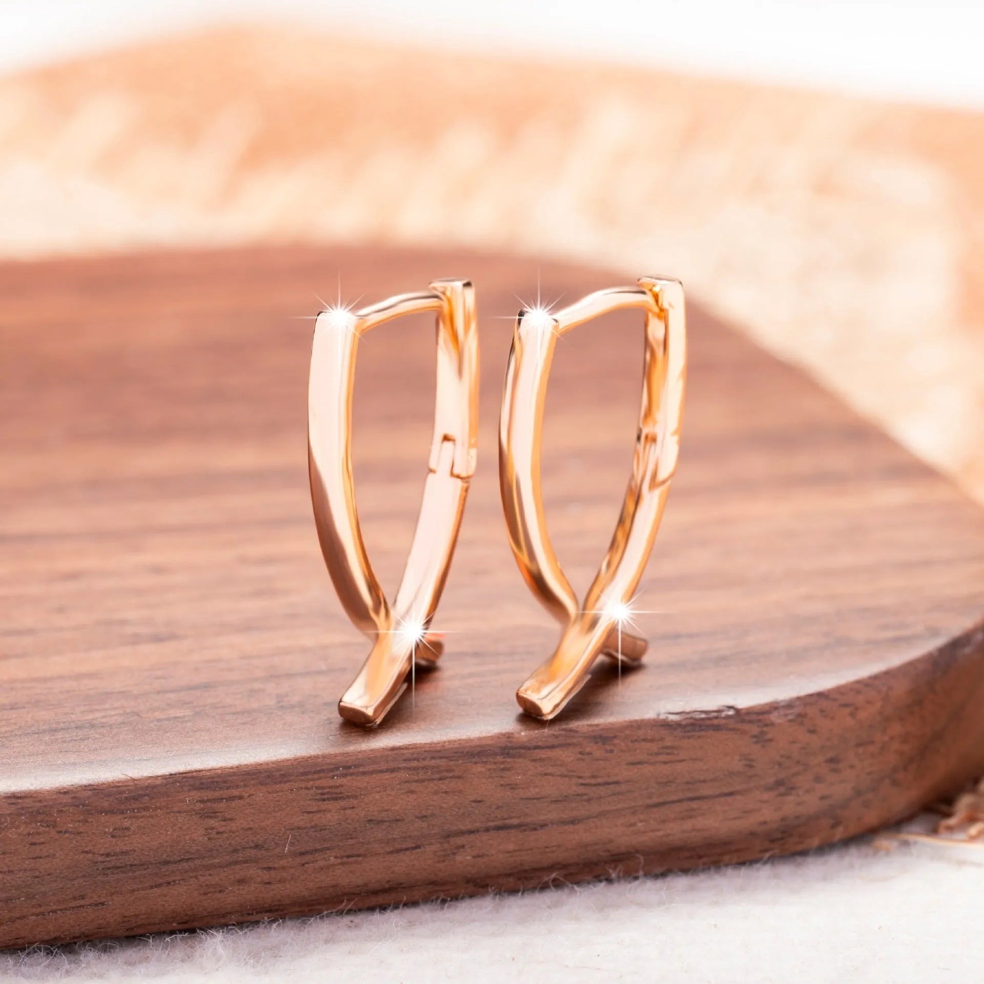 Rose gold cross shaped copper earrings single pair jewellery accessory