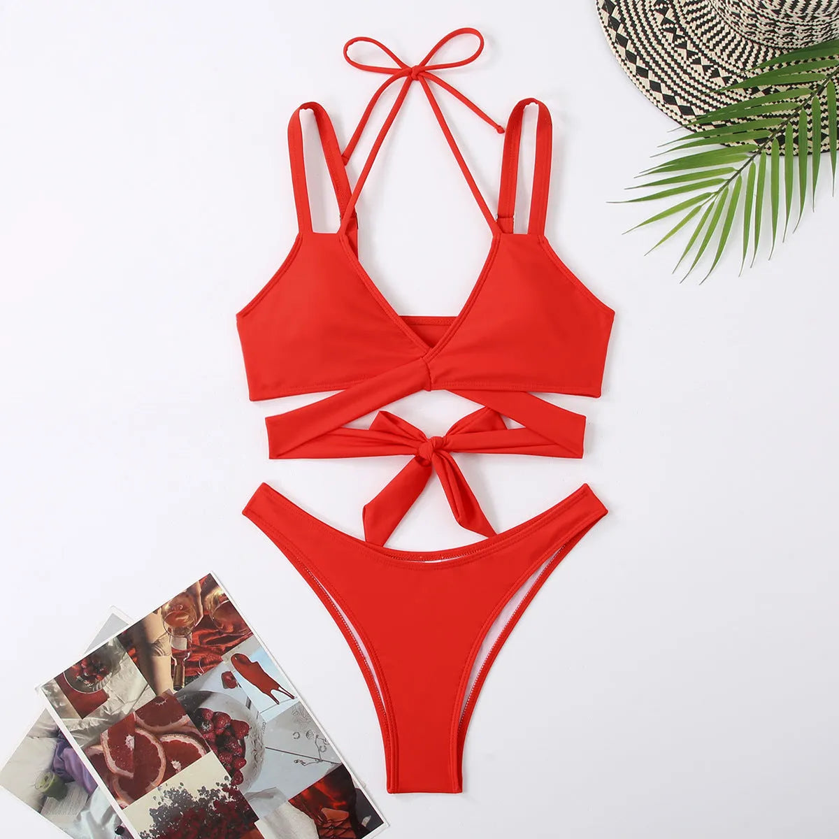 Women's solid colour strappy bikini swimsuit on a hanger, shown in briefs style.