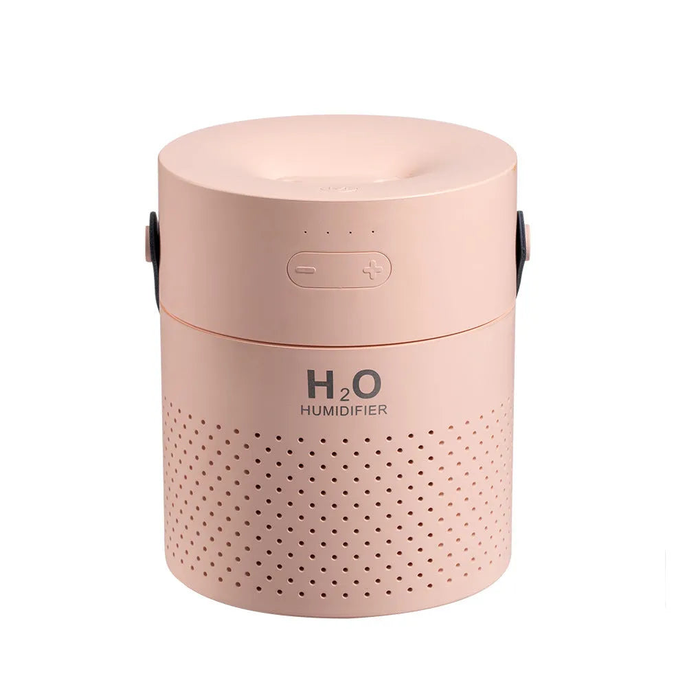 Green wireless bedroom humidifier with colour-changing light and USB port on a bedside table