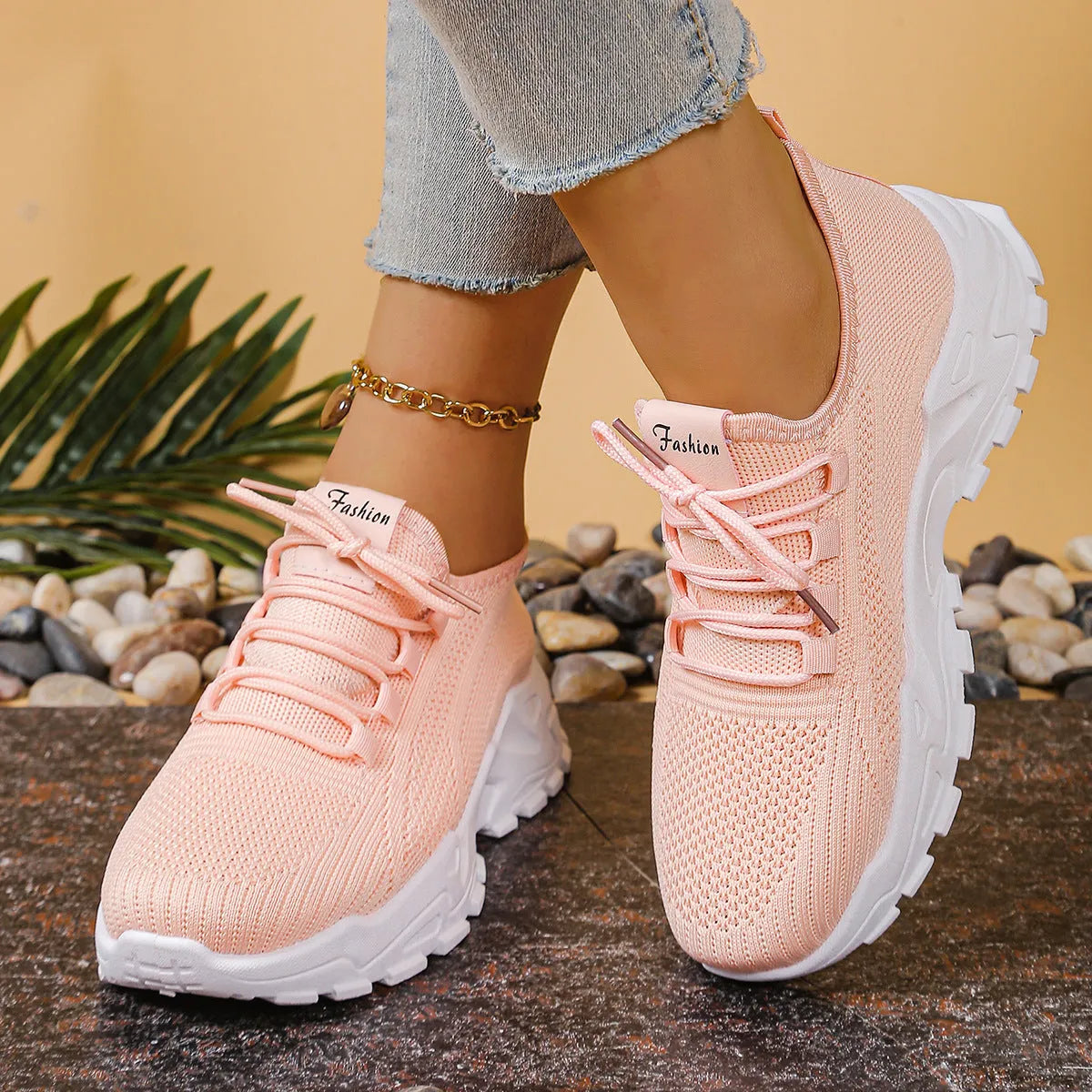 Women's low-top mesh sneakers in various colours with a platform sole and front lace-up design.