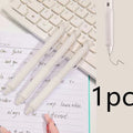 Macaron Colour press gel pen with 0.5mm tip in smoked white, brown, or pink ink options.