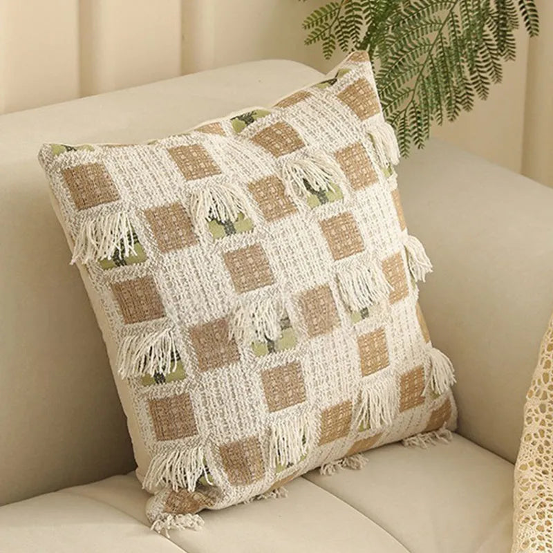 Jacquard floral pattern cushion cover in a retro colour, 45cm square, on a sofa.